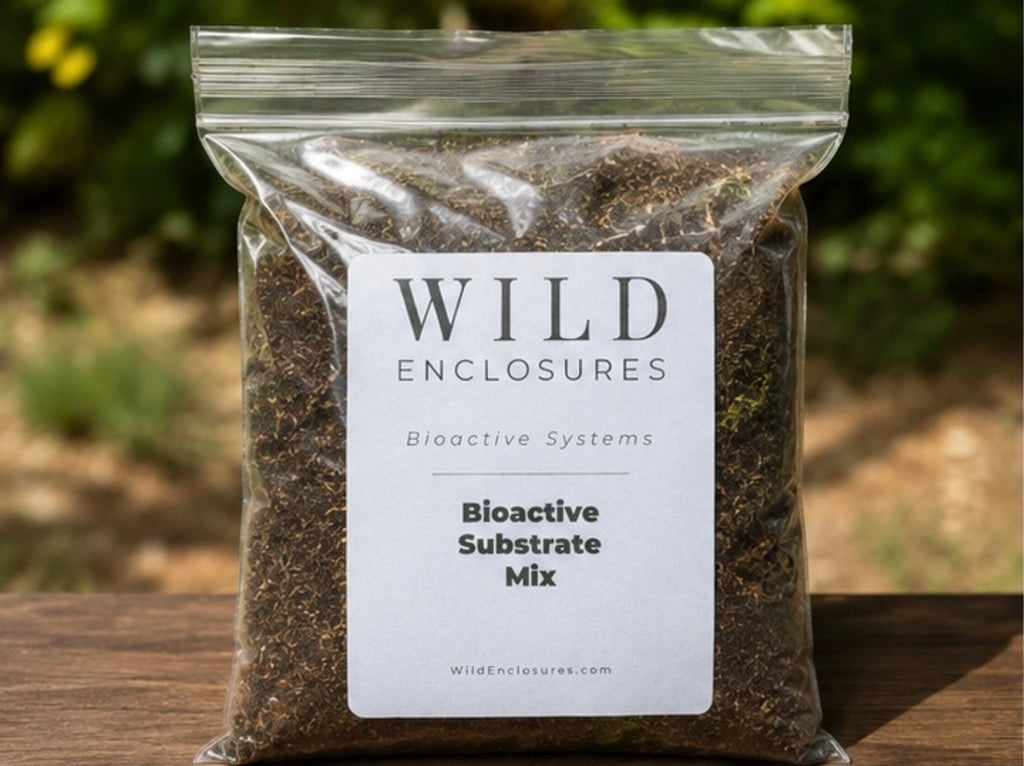 Bag of Wild Enclosures Bioactive Substrate Mix displayed outdoors on a wooden surface with a natural garden background. This premium bioactive substrate blend supports isopods, springtails, beneficial microfauna, tropical plants, reptiles, amphibians, and thriving terrarium and vivarium ecosystems.