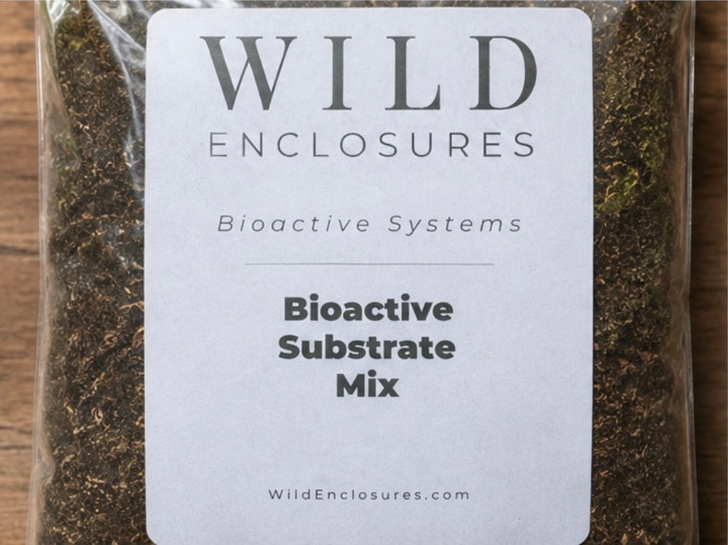 Close-up of Wild Enclosures Bioactive Substrate Mix packaging label on a bag of natural terrarium substrate. This ready-to-use bioactive soil blend supports isopods, springtails, beneficial microfauna, tropical plants, reptiles, amphibians, and healthy vivarium and terrarium ecosystems.