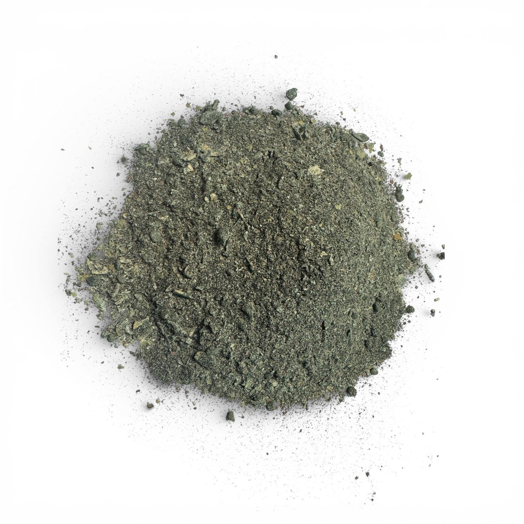 Isopod and springtail food blend powder close-up on white background
