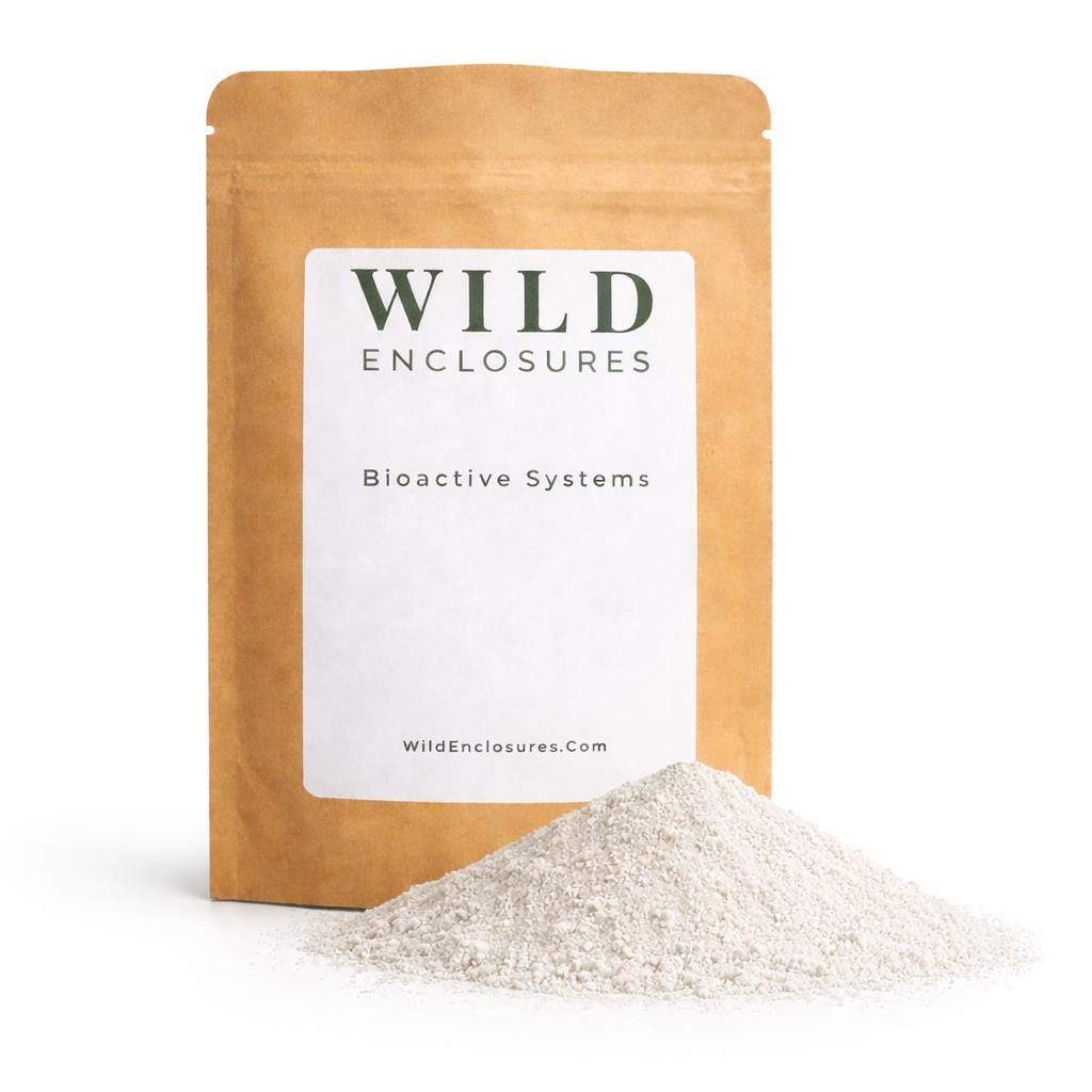 Kraft stand-up pouch labeled “Wild Enclosures – Bioactive Systems” on a white background with a small pile of Calcium & Reptile Supplement displayed in front of the bag.